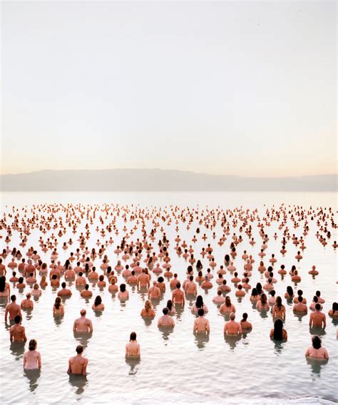 spencer tunick nantucket  Tunick believes that something unique happens when human bodies are brought together in large quantities – they lose their individual forms and come together in a metamorphosis that transforms them into a single, unified mass, a liquid substance that stretches across the landscape